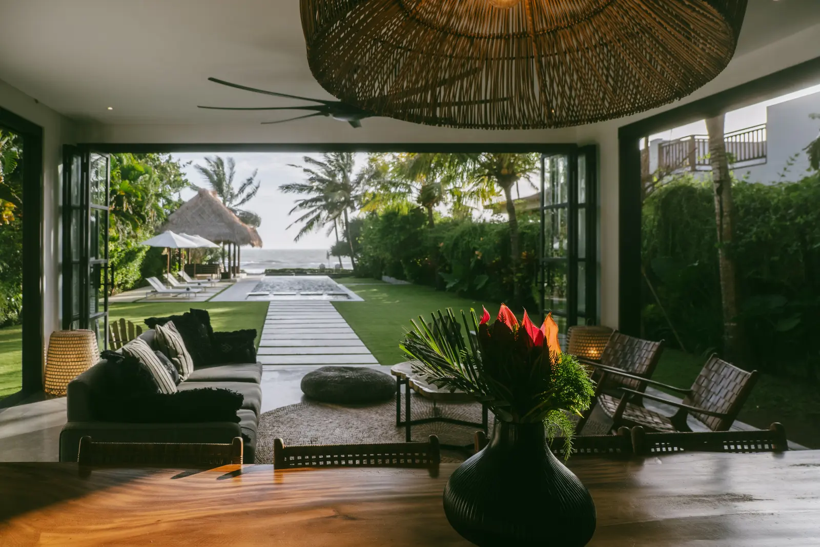 Open living and dining space looking toward Pasut Beach